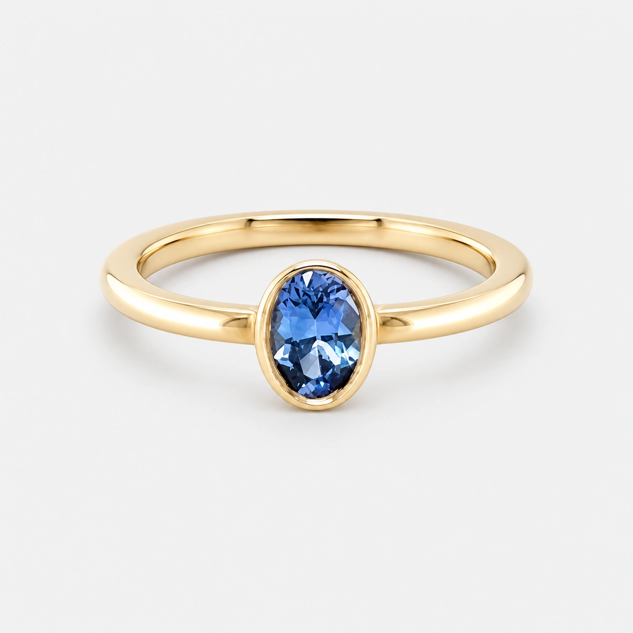 14K Yellow Gold Oval Brilliant Cut Blue Sapphire Ring