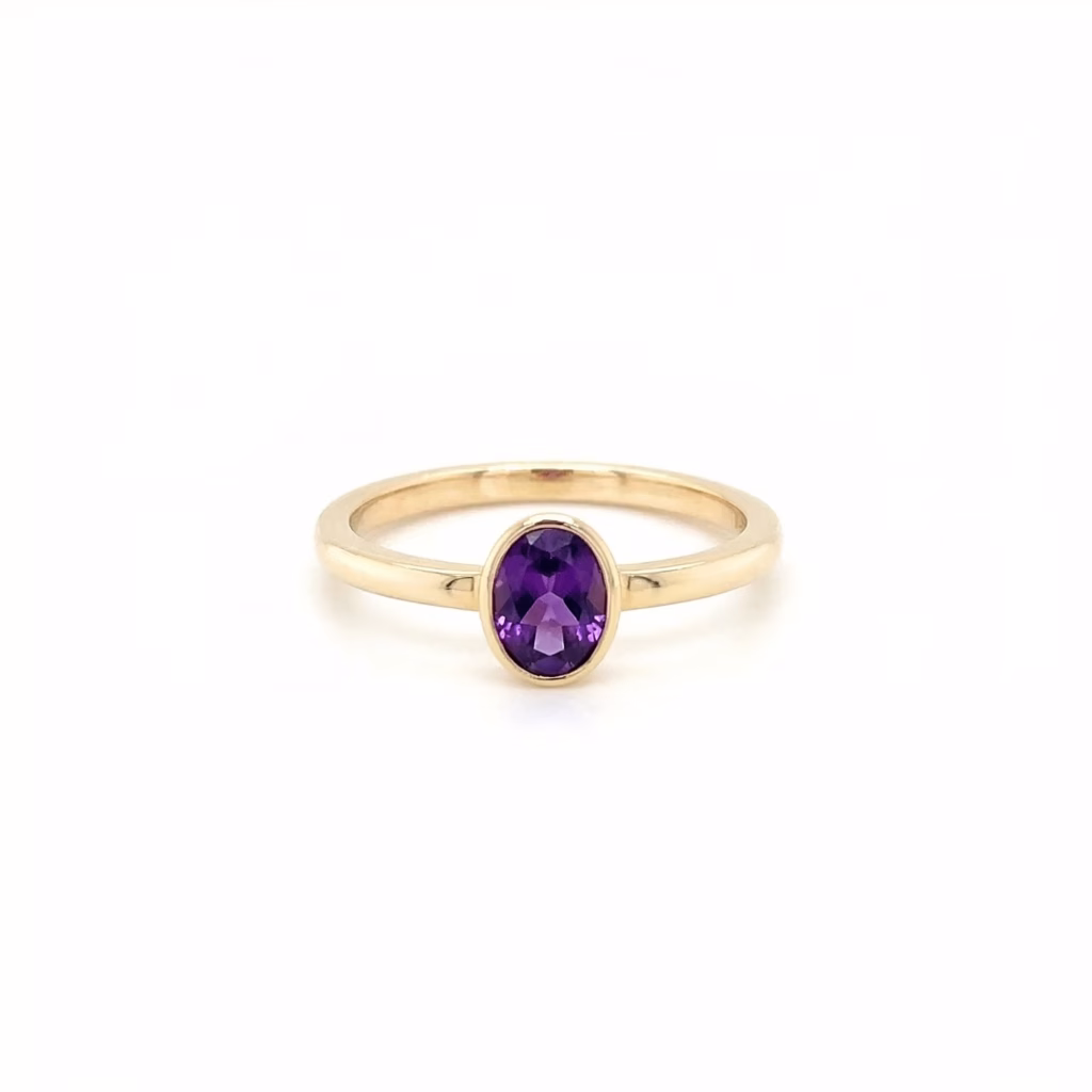 Trish Arato oval amethyst bezel solitaire ring in 14K yellow gold